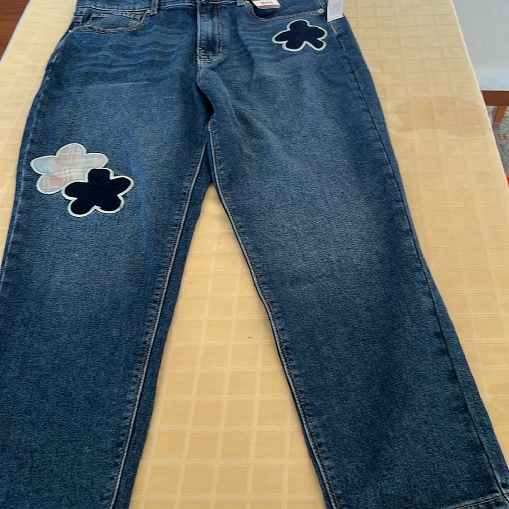 Blue jeans with flowers